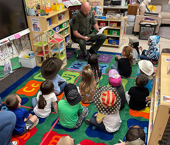 Game Warden Collier reading to Mrs Bolyard's Class